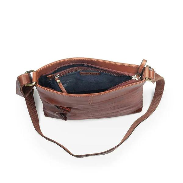 Top-down view of the open Boho Layered Leather Bag - Ridgeback, showing the zipped main compartment and inner branding for a touch of elegance.