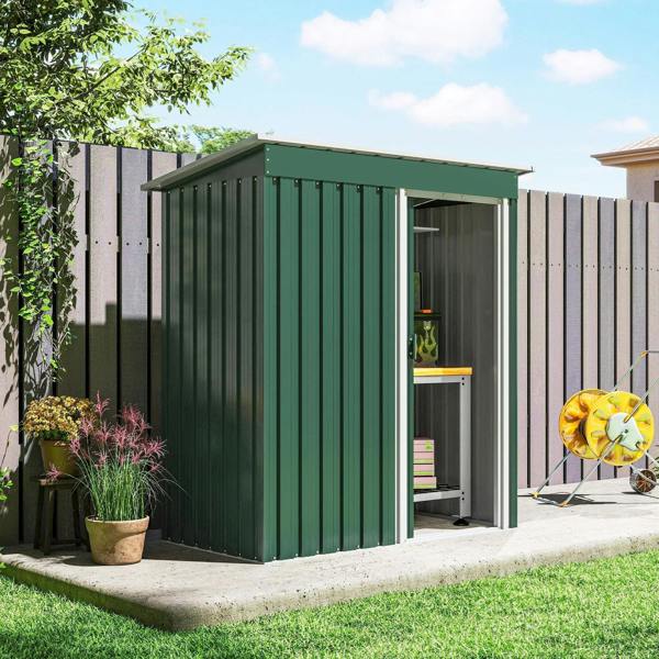 Green metal garden shed with sloped roof and open sliding door at the front