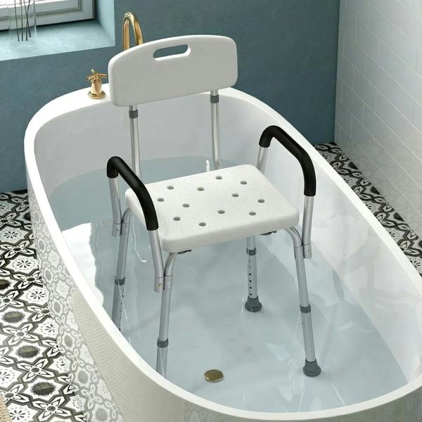 White shower chair with backrest and black armrests, perforated seat for drainage
