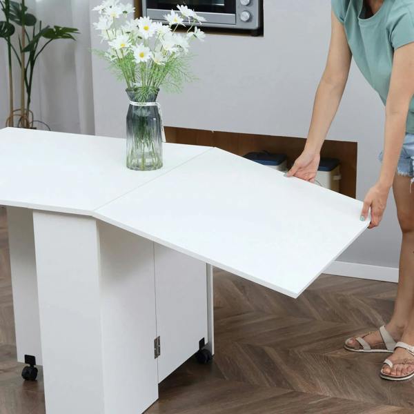 White drop-leaf folding table with extended tabletop section