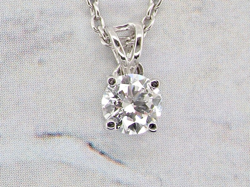 Vintage Tom A fine half carat diamond pendant