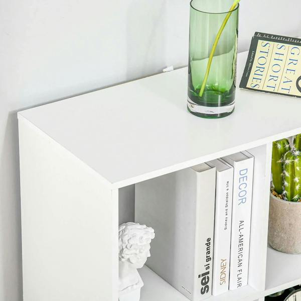 White 6-cube bookshelf corner showing open cubbies and stored books