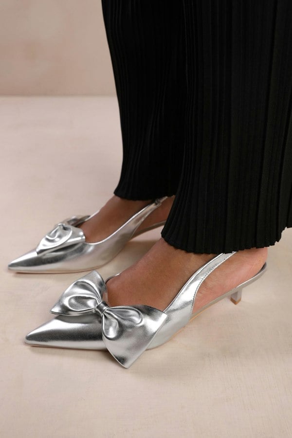 Where's That From Santorini Low Kitten Heels With Pointed Toe and Bow Detail in Silver