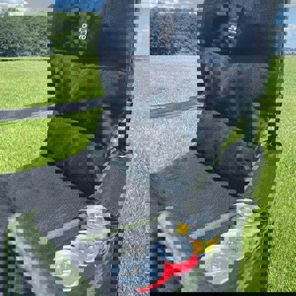 Henwick Padded Folding Camp Chair Orange & Black by OLPRO, close up showing  the can cooler pocket feature.