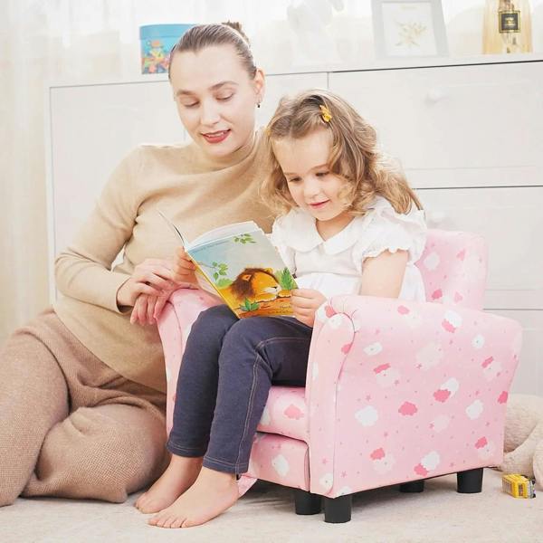 Pink cloud-pattern toddler armchair with high back, armrests, and pull-out ottoman