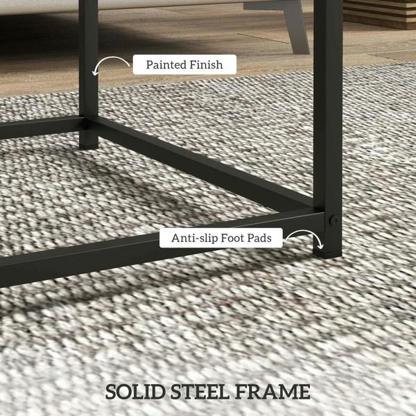 Bottom view of black steel base with anti-slip foot pads on nesting coffee tables