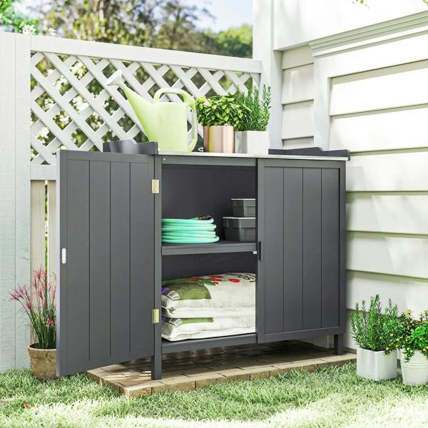Grey outdoor storage cabinet with both doors open and central shelf