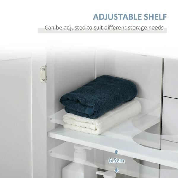 White under-sink cabinet showing adjustable shelf with folded towels inside