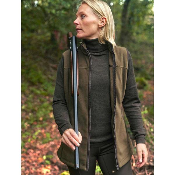 Woman wearing Deerhunter Lady Eagle Fleece Waistcoat while shooting in woodland