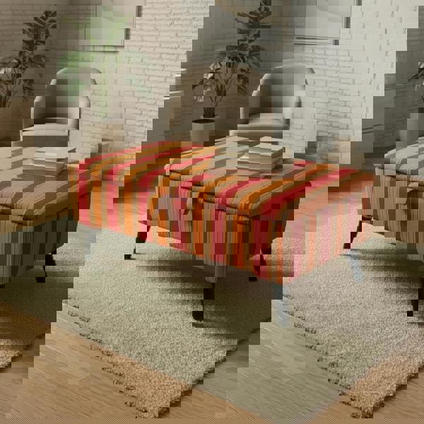 Versatile footrest and storage unit with strong black legs