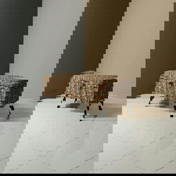 Modern geometric fabric ottoman used as coffee table with tray on top