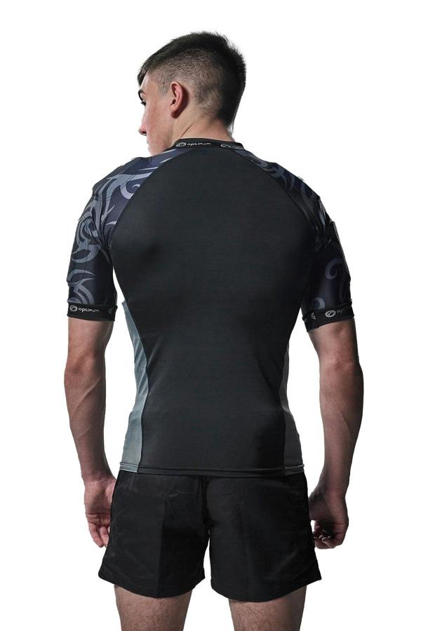 Black and grey Optimum Razor protective top, rear view of tribal-print padded shoulders on model - Optimum