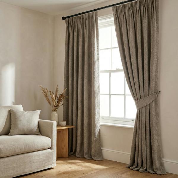 Athens made-to-measure curtains in Argento, styled in a living room