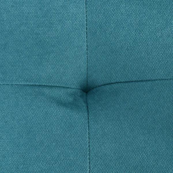 Close-up of blue upholstered sofa bed fabric with stitched seams