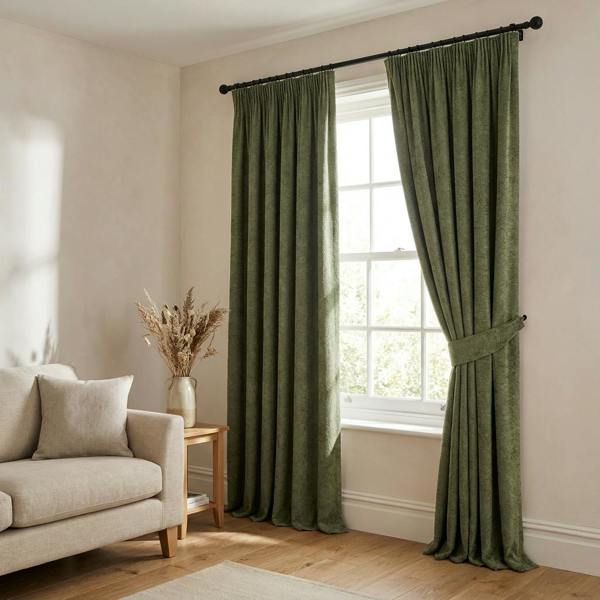 Tuvalu made-to-measure curtains in Forest, styled in a living room