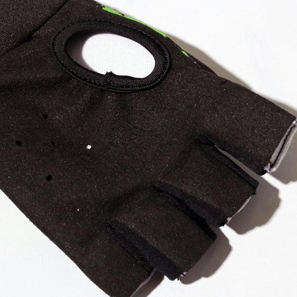 Close-up of black Optimum Fusion half-finger hockey glove palm with ventilation opening and holes, on white - Optimum