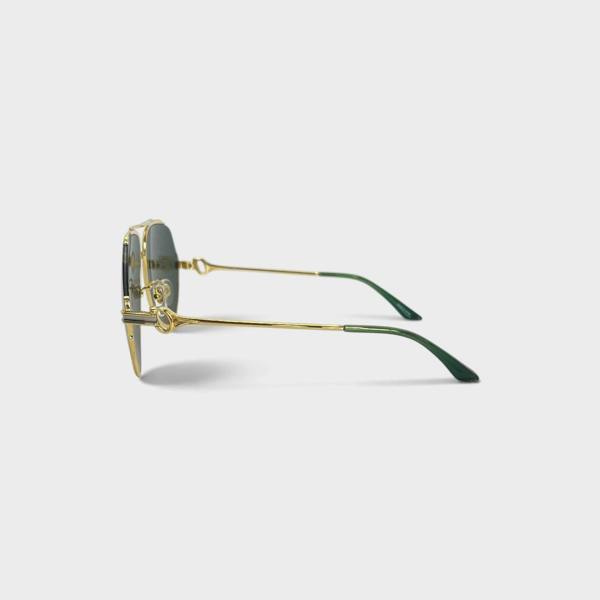 Supplied Fashion rounded stainless steel sunglasses with green lenses and gold frames, side profile view.