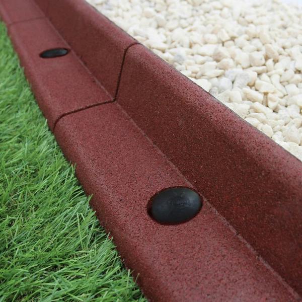 Flexible terracotta lawn edging, 1.2m long, featuring a textured surface and rounded shape, complements grass and gravel areas