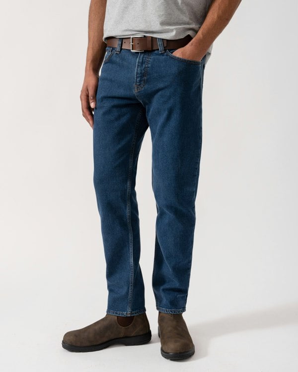 Model wearing BOSS Orange Mens ReMaine Jeans in Dark Blue 409 - Main