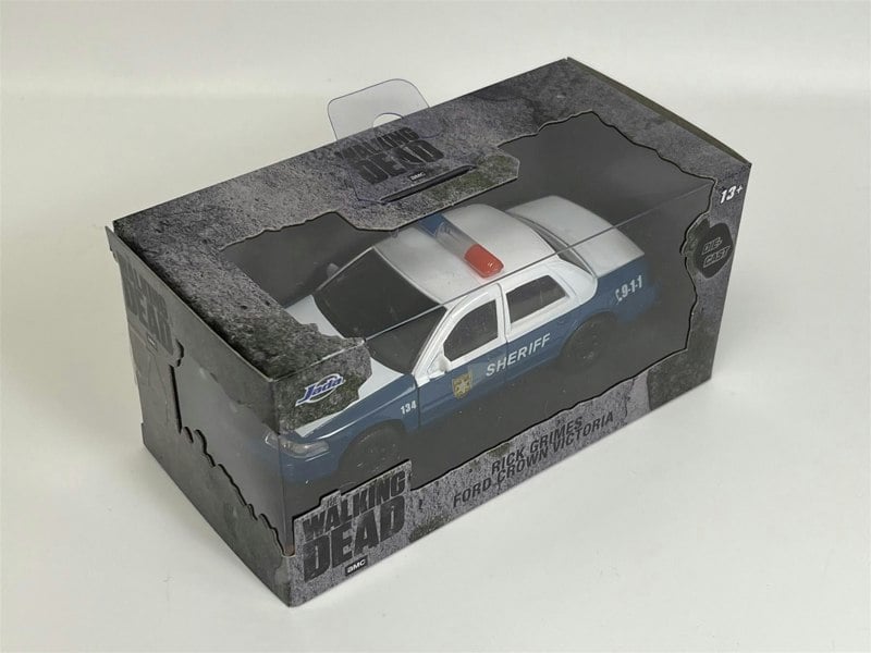 a toy car in a box
