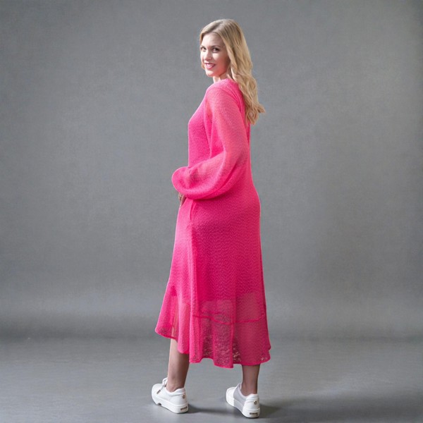 Women's Aphrodite Hot Pink Holiday Resort Dress with a hot pink undergarment shown from the side, paired with white sneakers