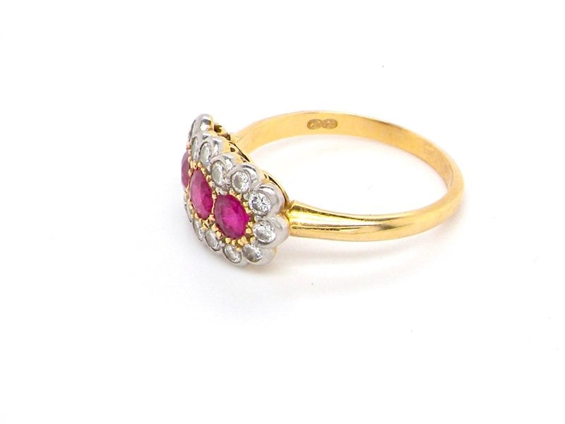 Vintage Tom An 18 carat gold triple cluster ruby and diamond ring