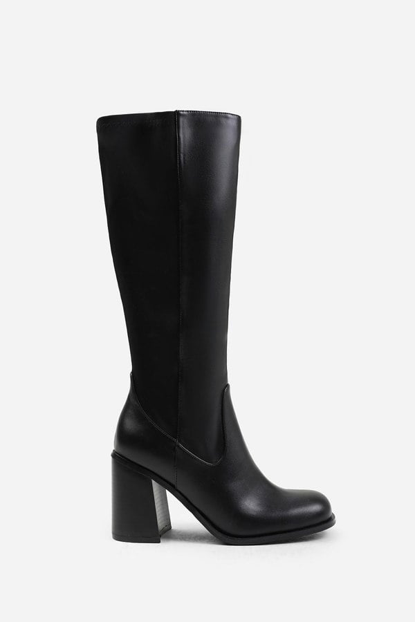 Where's That From Zhuri Stretch Wide Calf Block Heel Knee High Boots In Wide E Fit In Black Faux Leather