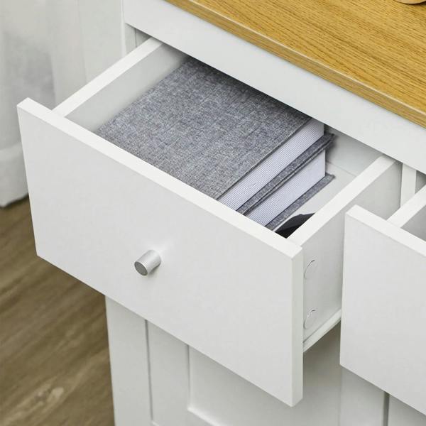 White sideboard drawer open with gray fabric lining and metal knob