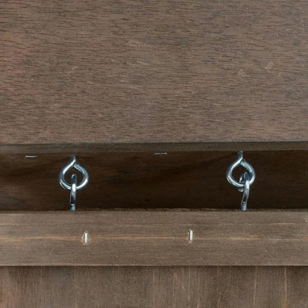 Brown wooden panel with two metal eye hooks for attaching parts