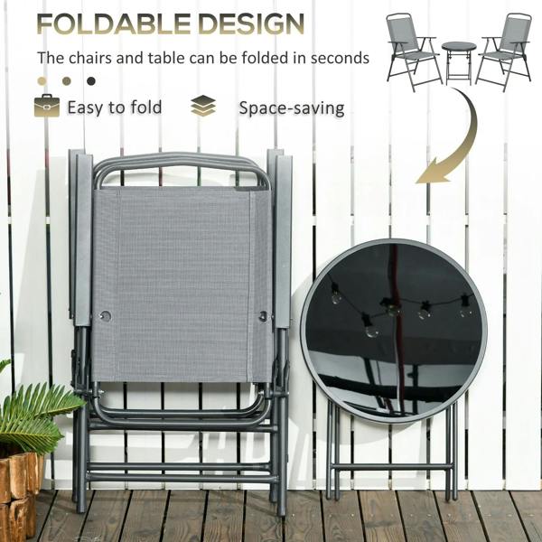 Folded light grey garden chairs with round glass-top table, space-saving design
