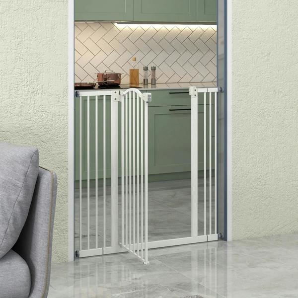 White pressure fit dog safety gate with swinging door in a doorway opening