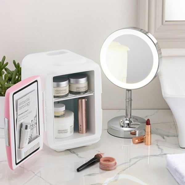 Subcold Classic 4 litre skincare fridge on vanity table with beauty products