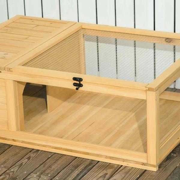 Wooden reptile enclosure with open mesh roof section and side entry opening.