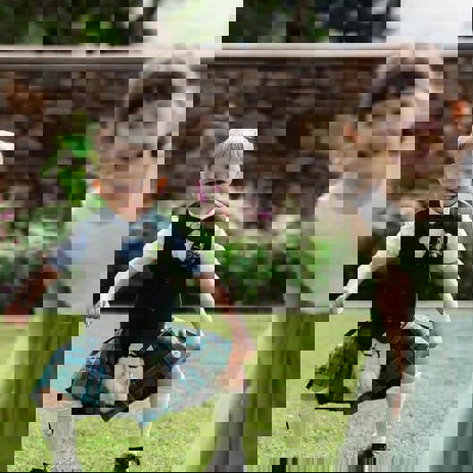 young boy in his kilt