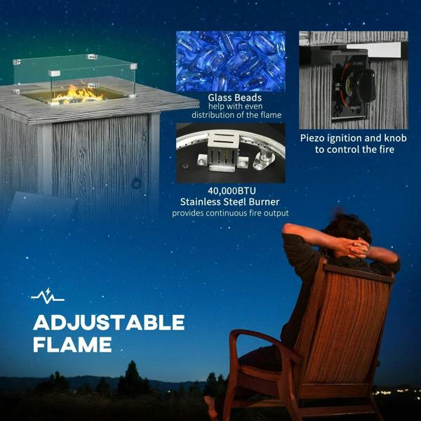 Grey gas fire pit table with glass wind screen and stainless steel burner area
