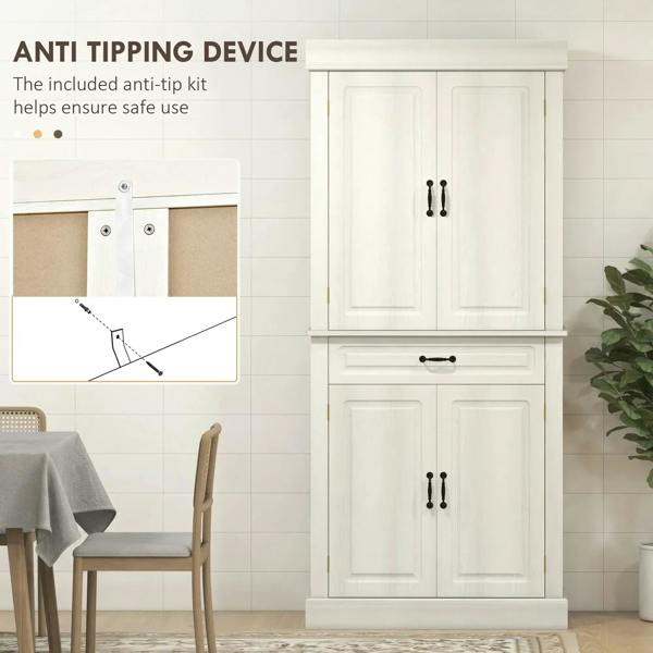 White tall cabinet with two doors and center drawer; anti-tip strap visible