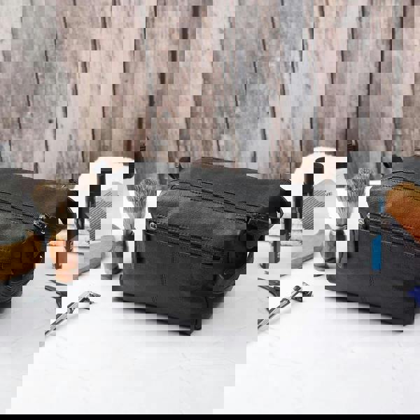 Lifestyle view of Black leather wash bag