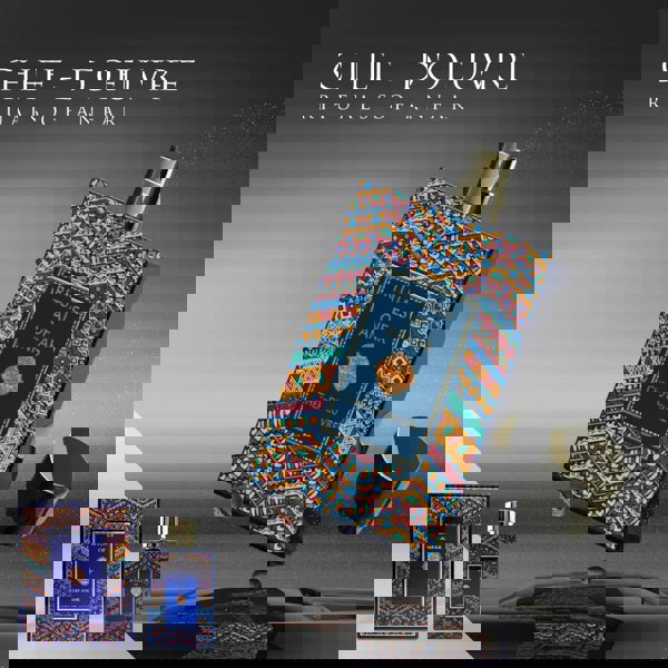 Chef-D'Oeuvre Rituals Of Anfar banner Perfume bottle with colorful geometric design and 'Chef-D'Oeuvre' branding on a gray background