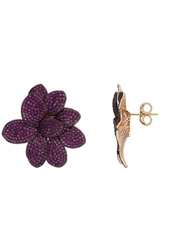 Push backing of the earrings.