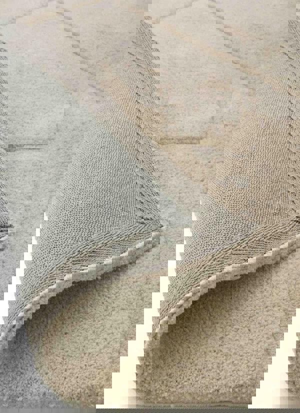 Close-up of a Scandinavian deep pile rug in cream and grey, showing soft texture and durable cotton backing.