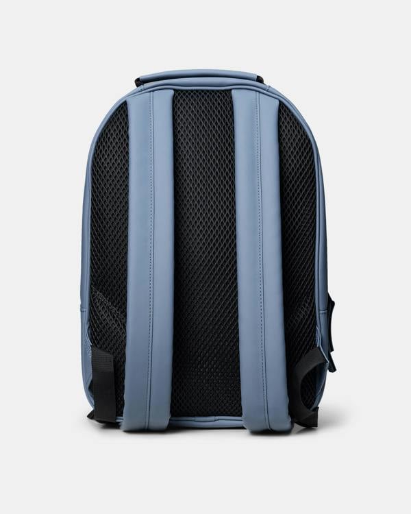 back shot of Rains Book Daypack in 172 Blue Dusk