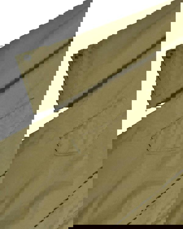 Lambretta RipStop Mens Waterproof Hooded Classic Badge Parka Coat, close-up of the khaki green waterproof fabric, sleeve with buttoned cuff, and chest pocket details.