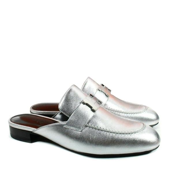 Hermes Trocadero mules in a metallic silver grained leather