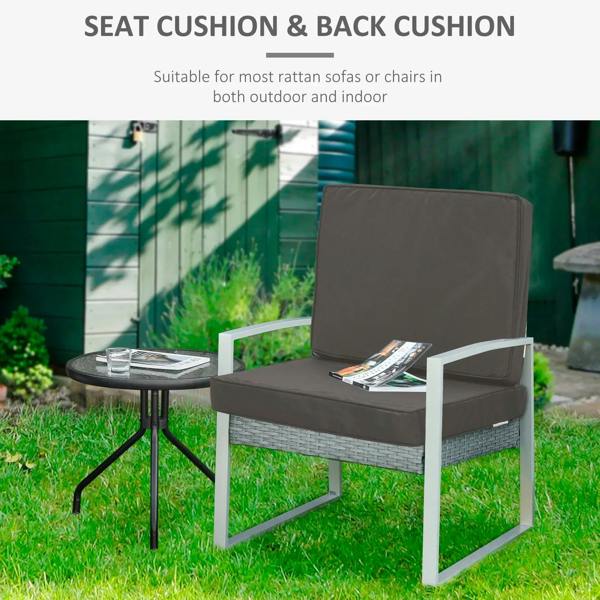 Dark gray seat and back cushions on an outdoor chair, smooth padded surfaces