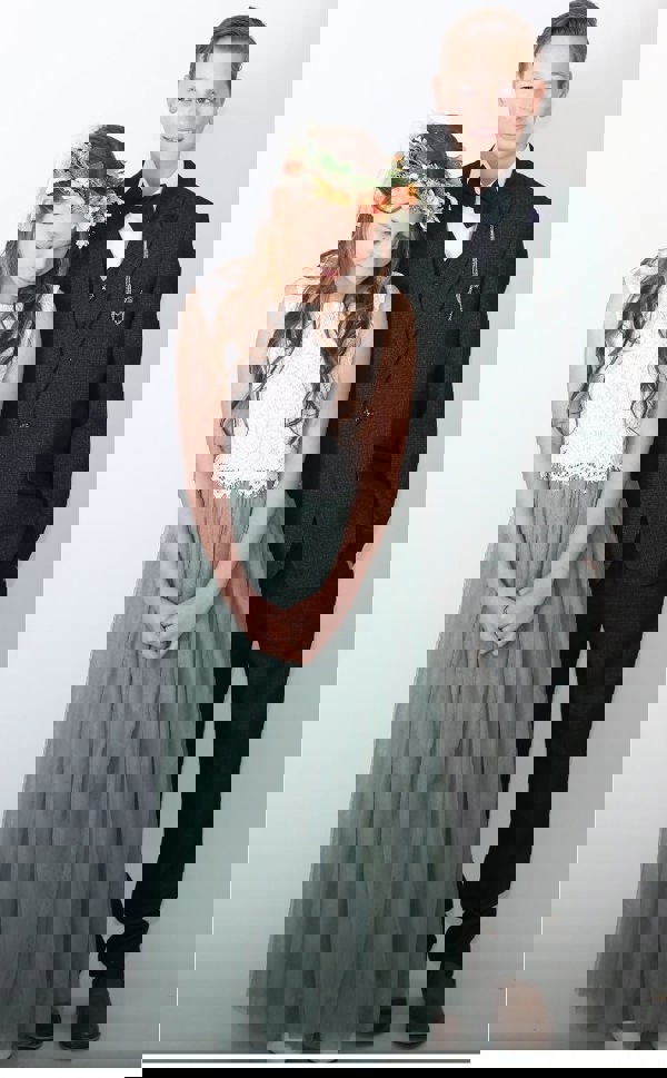 Young boy and flower girl in matching colours