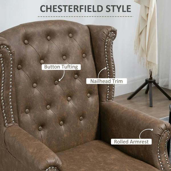 Brown Chesterfield-style armchair with button tufting and nailhead trim on rolled armrests