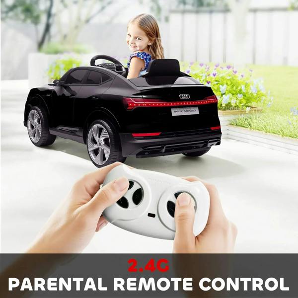 Black kids electric ride-on car with child onboard and parental remote controller