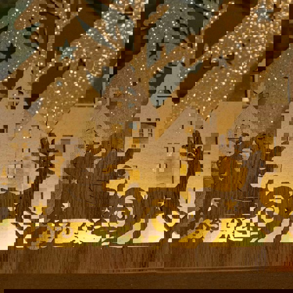 Samuel Alexander 20cm Battery Operated Light up Wooden Village with Santa in Sleigh and Warm White LEDs