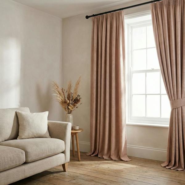 Faro made-to-measure curtains in Copper Blush, styled in a living room