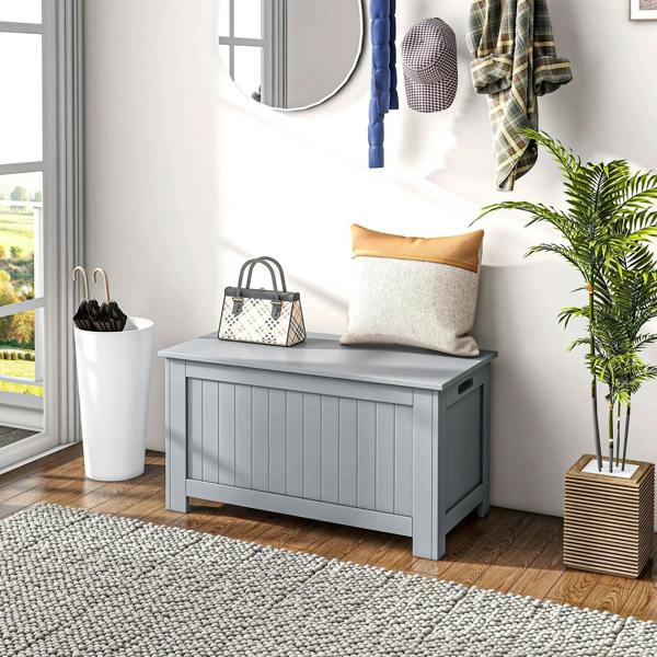 Grey toy chest storage cabinet with hinged lid in a room setting